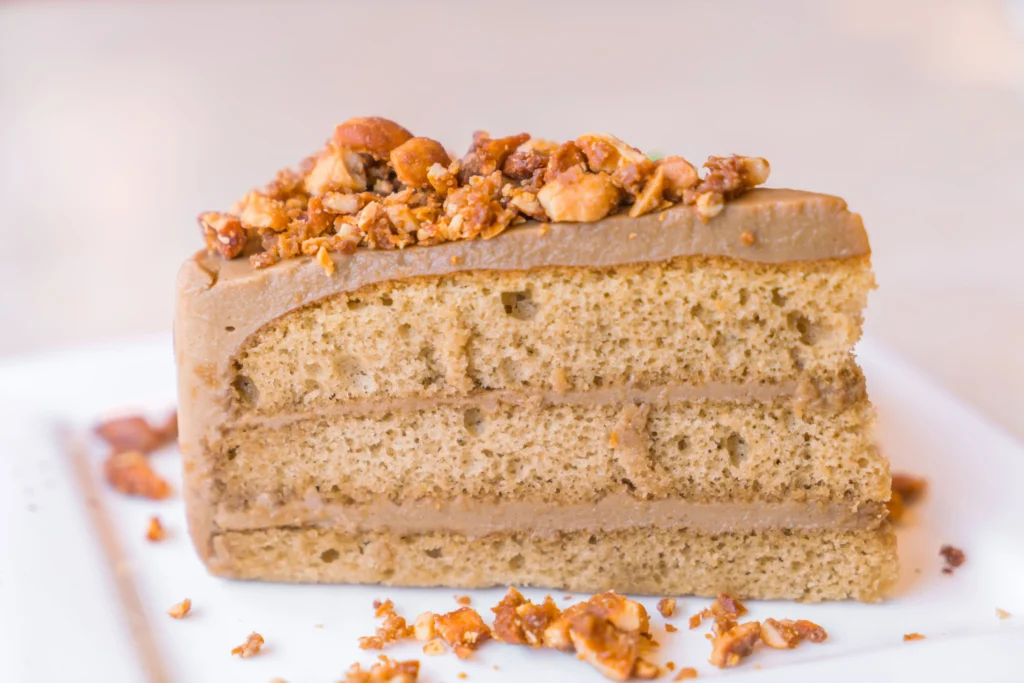 Homemade coffee cake with golden brown cinnamon sugar streusel topping in baking pan